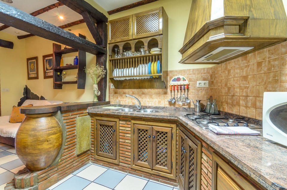 Apartment, 2 Bedrooms, Balcony | Private kitchenette | Fridge, microwave, stovetop, cookware/dishes/utensils