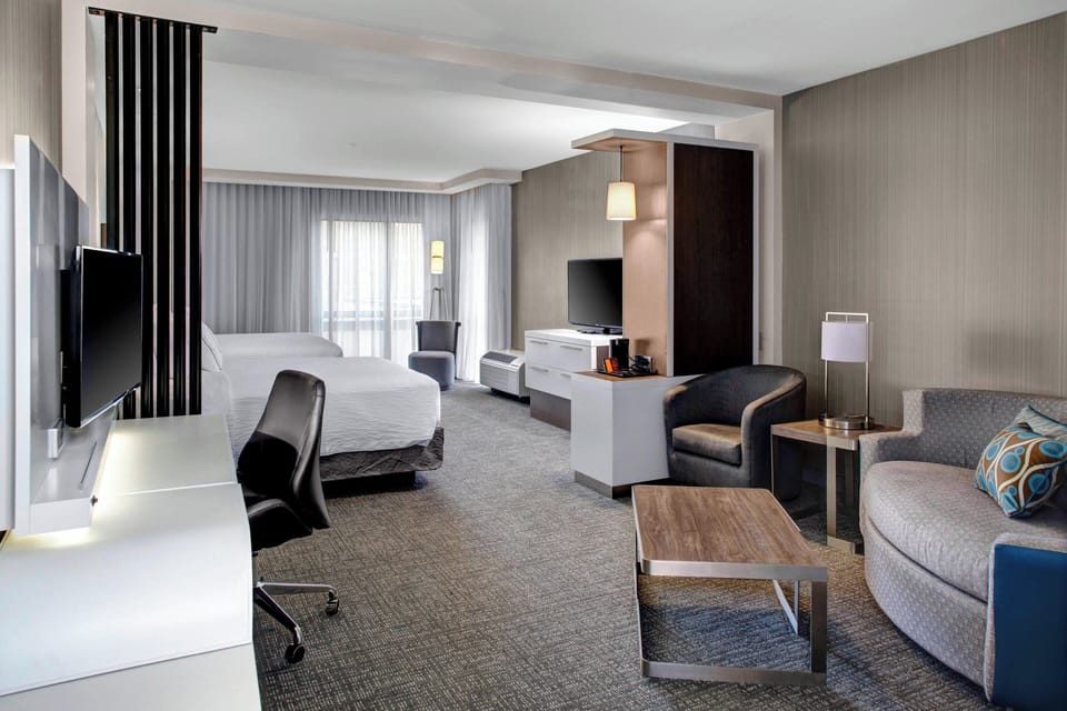 Suite, Multiple Beds | Egyptian cotton sheets, premium bedding, in-room safe, desk