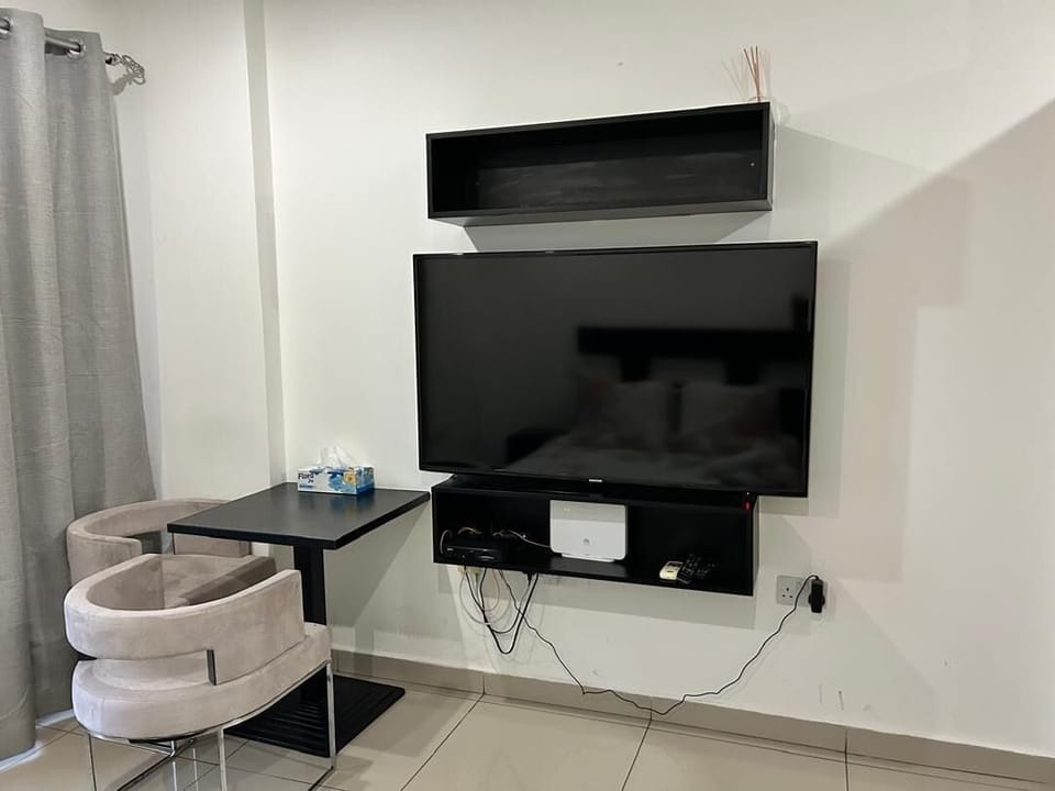 Luxury Apartment, Balcony, City View | Desk, laptop workspace, blackout drapes, soundproofing