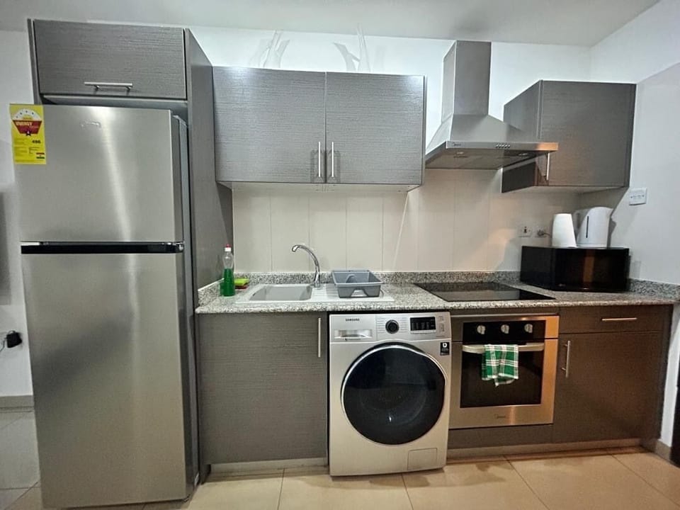 Luxury Apartment, Balcony, City View | Private kitchenette | Full-size fridge, microwave, oven, stovetop