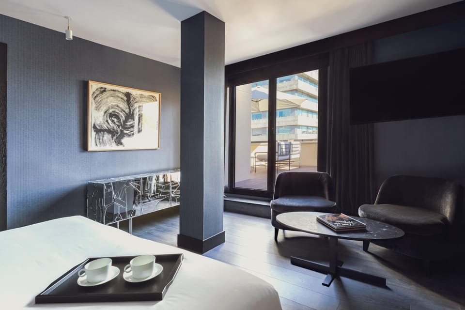 Rooftop Deluxe King with Terrace | Premium bedding, minibar, in-room safe, soundproofing