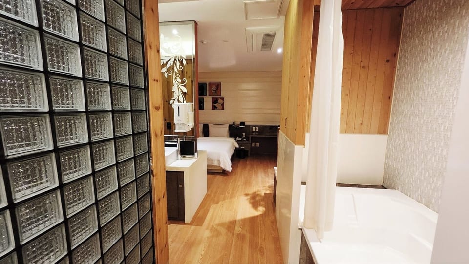 Deluxe Double Room, City View | Blackout drapes, soundproofing, iron/ironing board, free WiFi
