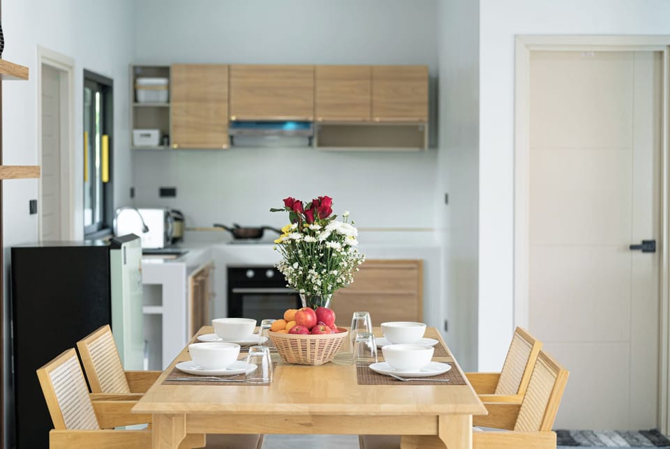 Family Triple Room, Pool View | Private kitchen