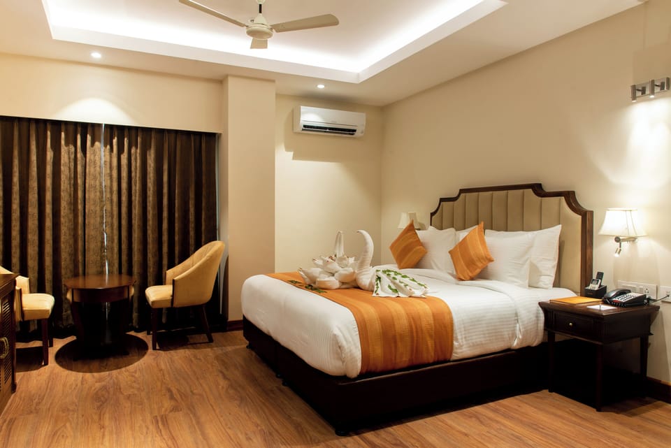 Family Suite, Park View | In-room safe, desk, laptop workspace, blackout drapes