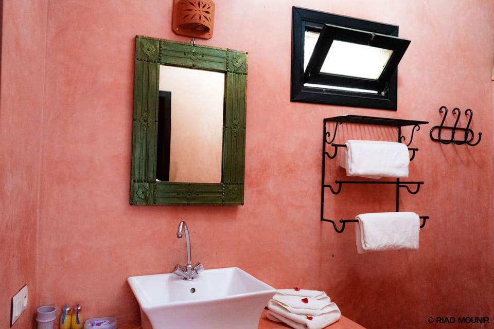 Shower, hair dryer, bathrobes, towels