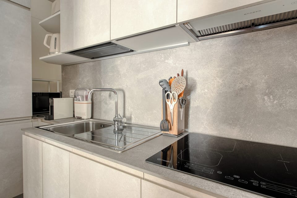 Apartment, 2 Bedrooms | Private kitchen | Dishwasher, espresso maker, electric kettle, dining tables