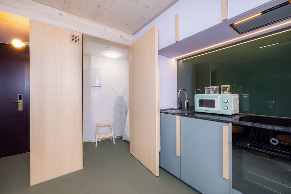 Modern Studio with Balcony | Private kitchen | Full-size fridge, oven, stovetop, dishwasher