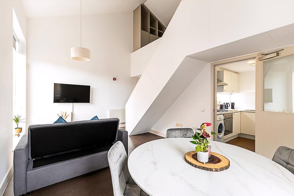 Apartment (Stylish Camden Flat Near Markets & Tu) | Living room | TV