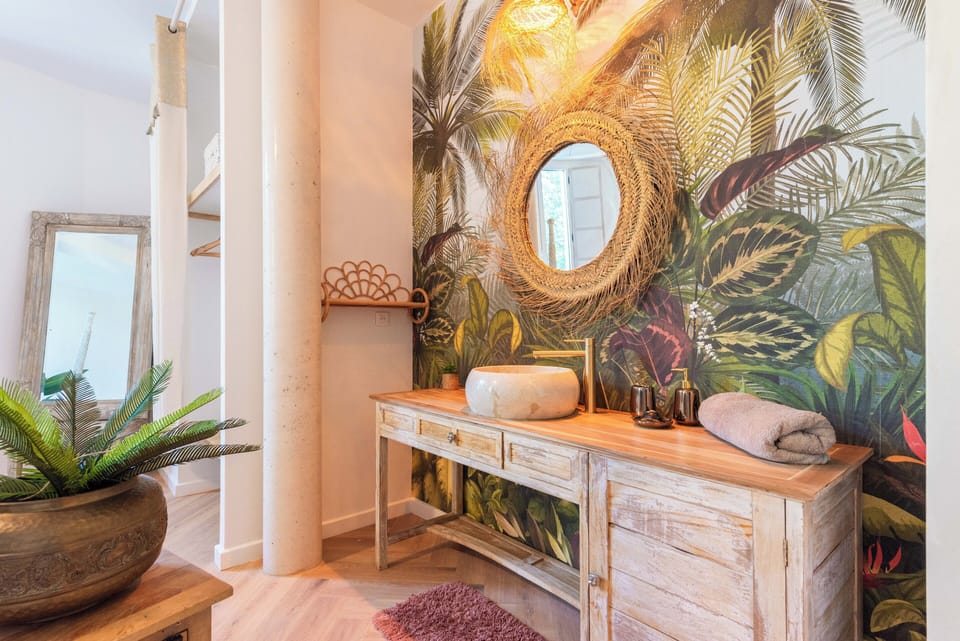 Deluxe Suite, Patio, Garden View | Blackout drapes, iron/ironing board, free WiFi