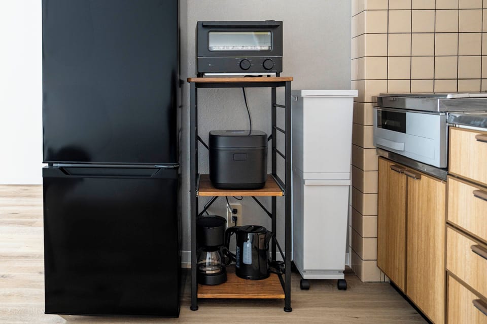 Full-size fridge, microwave, stovetop, toaster