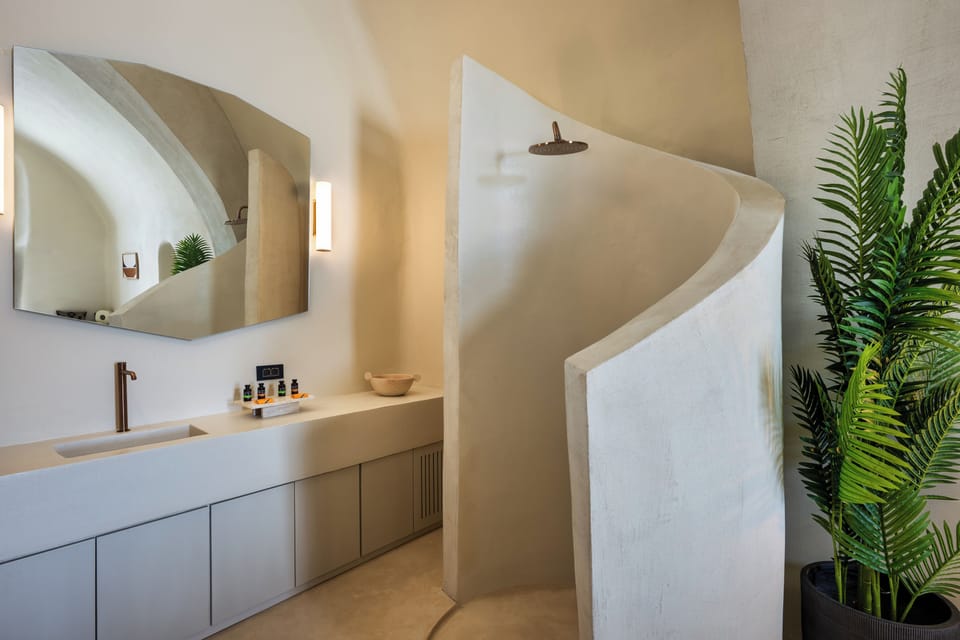 Cave Suite, Outdoor Tub | Bathroom | Shower, hair dryer, slippers, towels