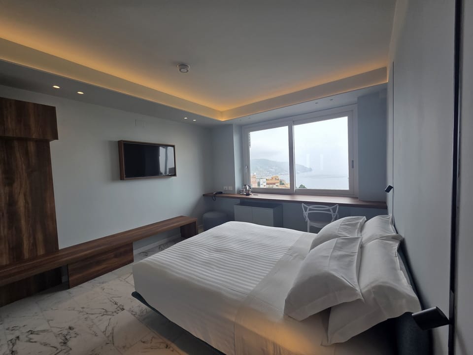 Room, Sea View | In-room safe, desk, laptop workspace, blackout drapes