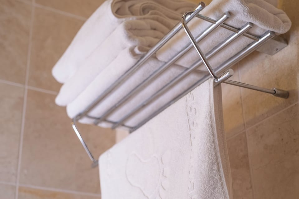 Shower, rainfall showerhead, eco-friendly toiletries, hair dryer