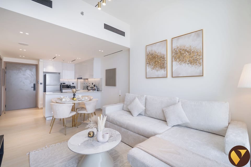 Luxury Apartment, Balcony, City View | Living area | 65-inch Smart TV with cable channels