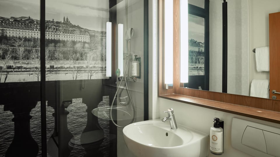 Eco-friendly toiletries, hair dryer, towels, soap