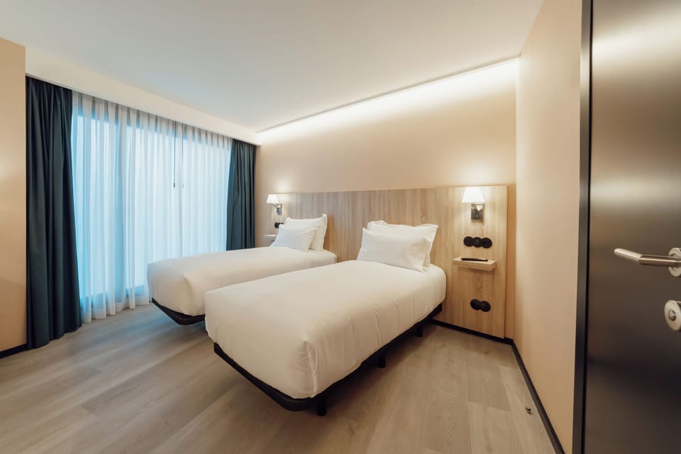 Family Room | In-room safe, desk, laptop workspace, blackout drapes