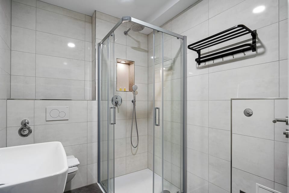 Hair dryer, slippers, towels, soap