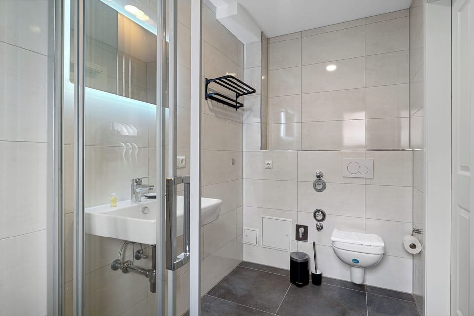 Hair dryer, slippers, towels, soap