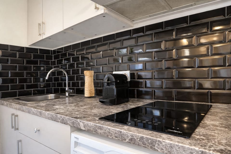 Superior Apartment, Courtyard View | Private kitchen | Espresso maker, electric kettle