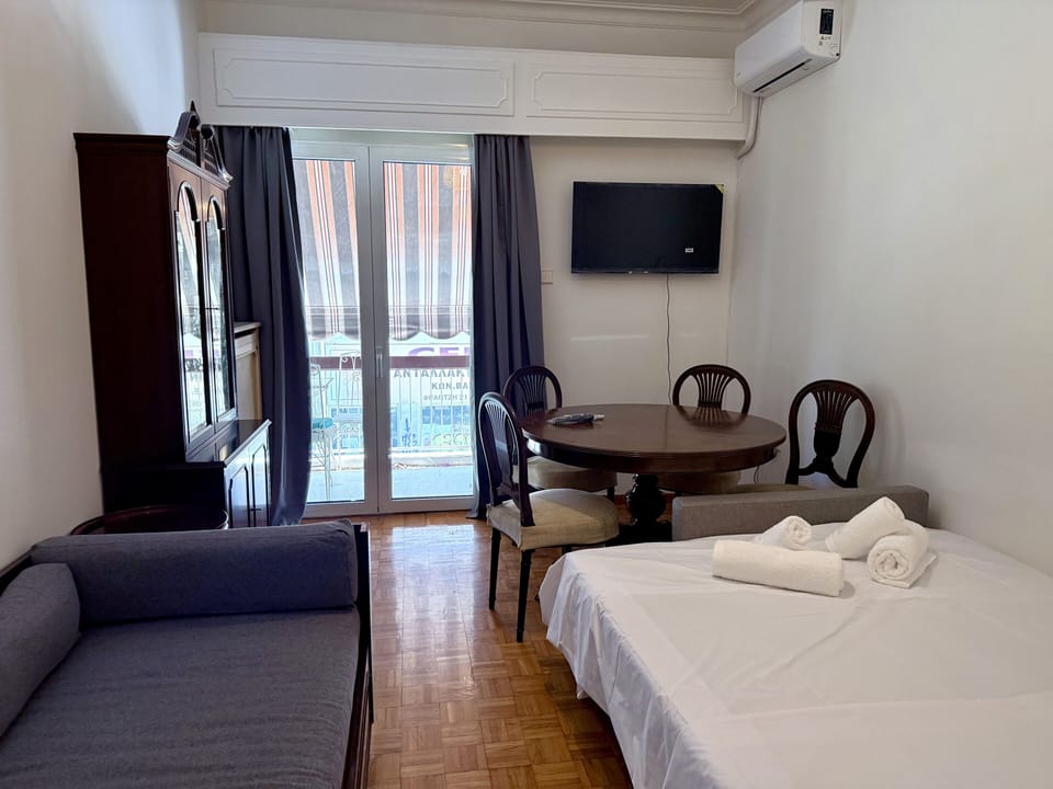 Apartment, Balcony | Living area | 30-inch flat-screen TV with digital channels