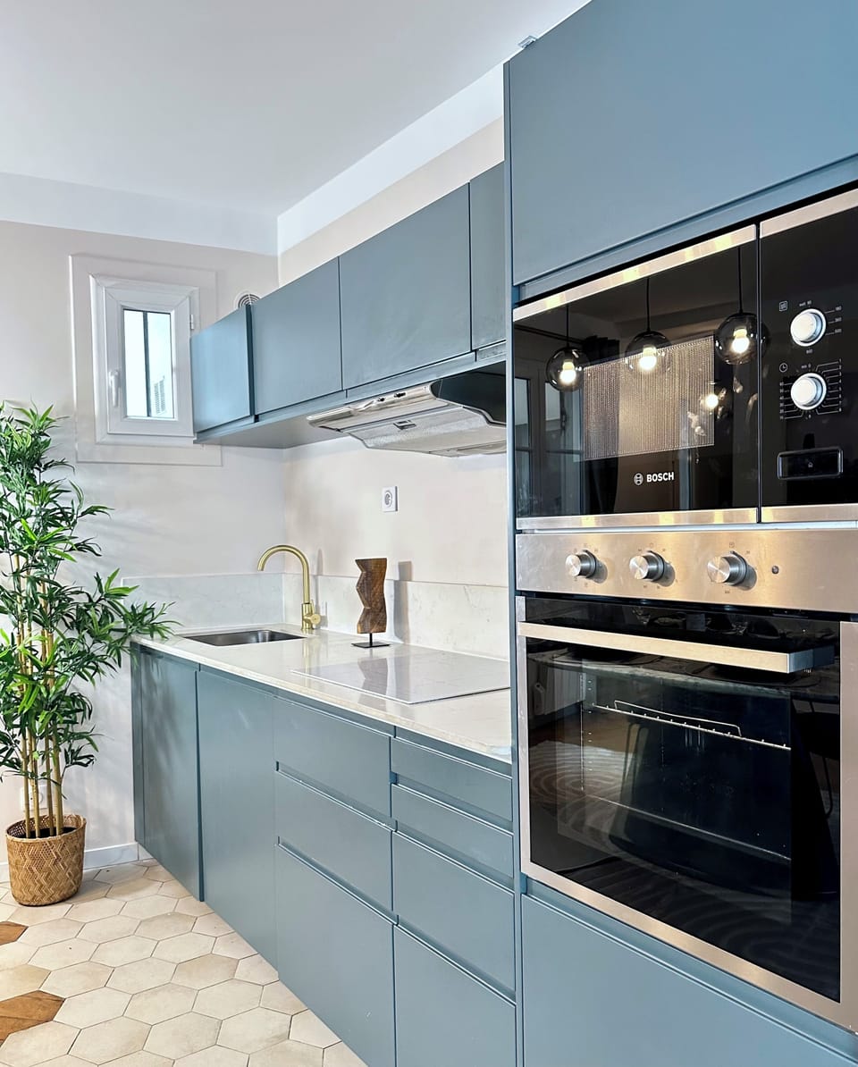 Deluxe Apartment, Courtyard View | Private kitchen | Espresso maker, electric kettle, toaster, freezer