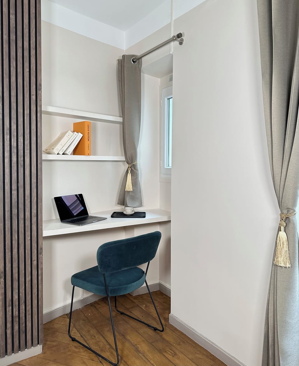 Deluxe Apartment, Courtyard View | Iron/ironing board, travel crib, free WiFi, bed sheets