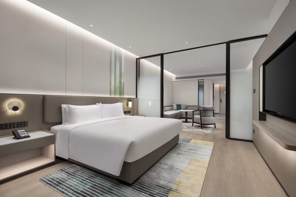 Premium bedding, down comforters, in-room safe, desk