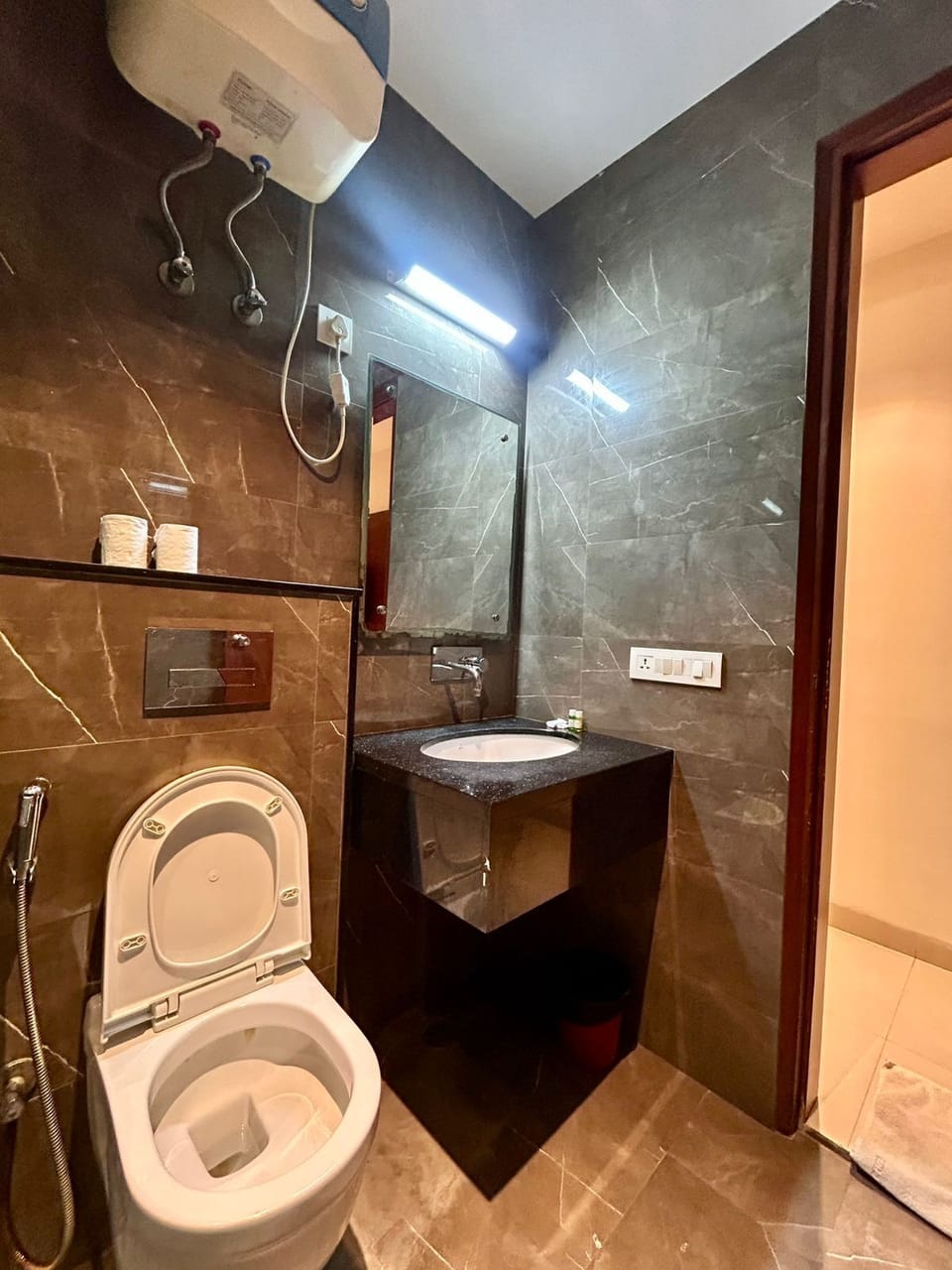 Deluxe Double Room, City View | Bathroom | Shower, designer toiletries, hair dryer, slippers
