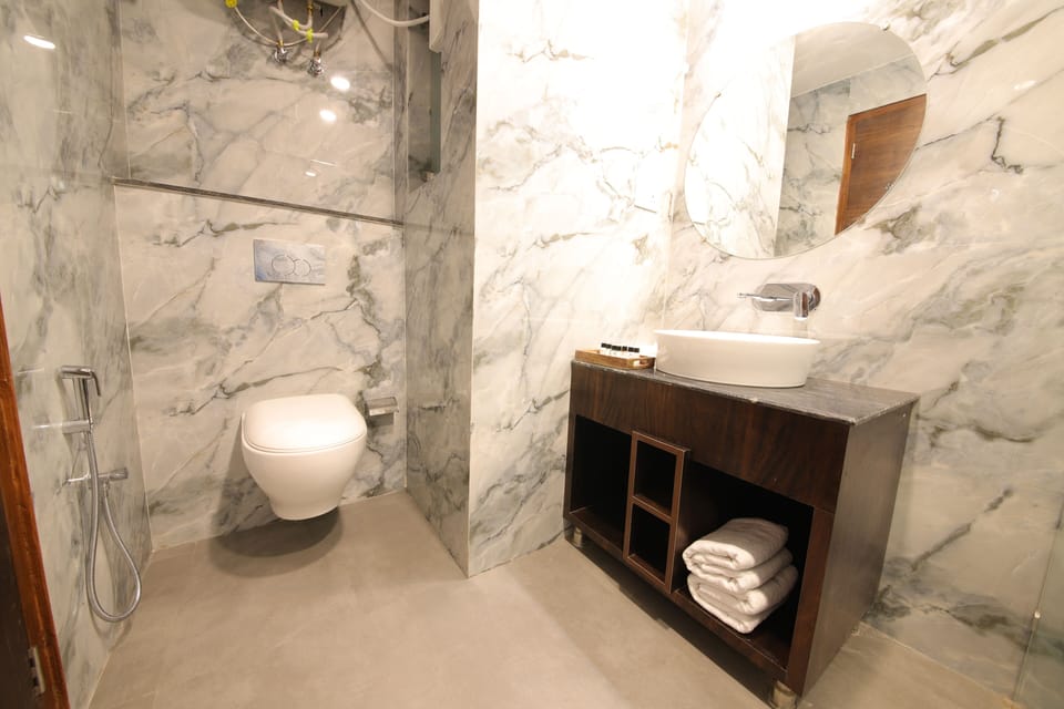 Shower, towels, soap, shampoo