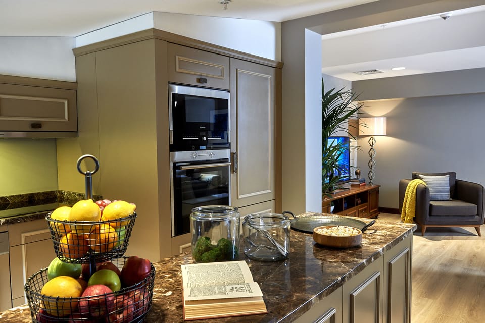 Penthouse King Suite With City View (Sauna & Hot Tub) | Private kitchenette | Coffee/tea maker, electric kettle, eco-friendly cleaning products