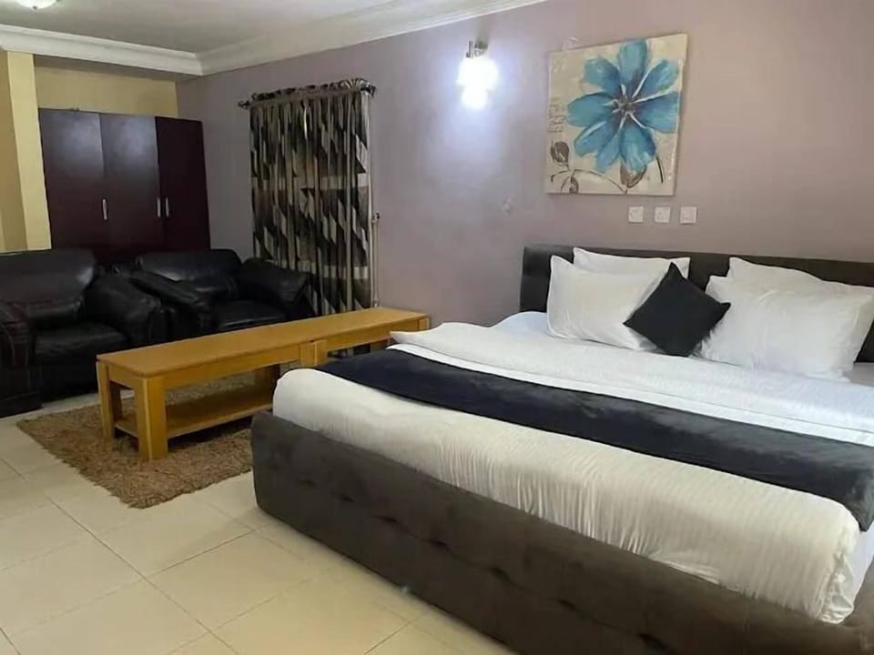 Economy Room, Balcony, City View | Desk, laptop workspace, blackout drapes, soundproofing