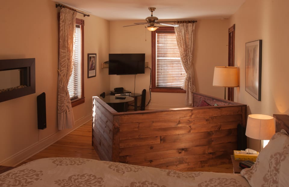 Superior Suite, 2 Bedrooms (Sous La Vigne) | Living area | 32-inch flat-screen TV with cable channels, TV
