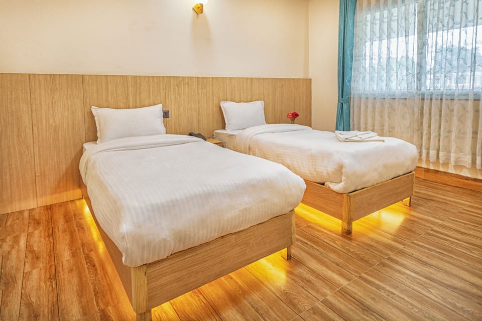 Deluxe Twin Room, Balcony | In-room safe, blackout drapes, WiFi (free)