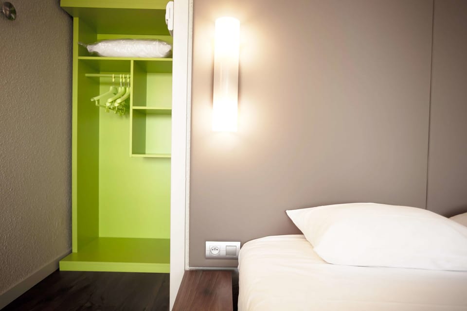 Premium bedding, desk, blackout drapes, iron/ironing board