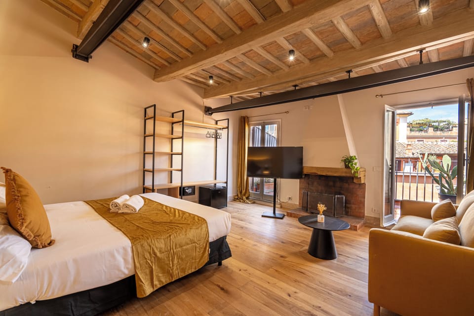 Junior Quadruple Room, City View | In-room safe, desk, iron/ironing board, free WiFi