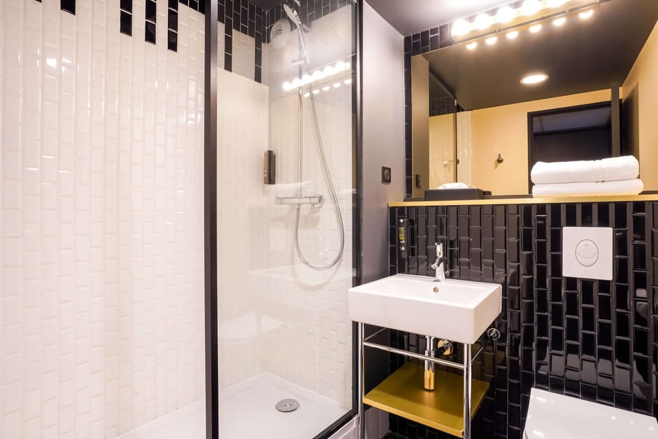 Eco-friendly toiletries, hair dryer, towels