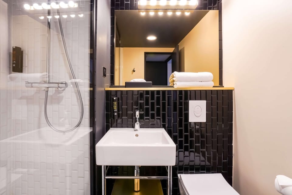 Eco-friendly toiletries, hair dryer, towels