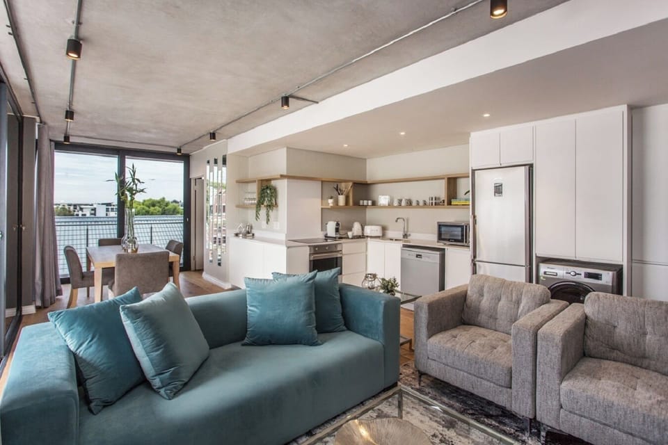 Executive Apartment, Balcony, City View | Living area | TV