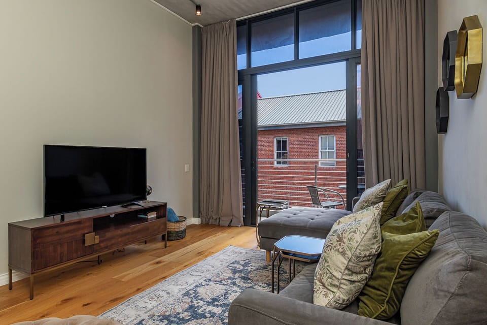 Luxury Apartment, Balcony, City View | Living area | TV