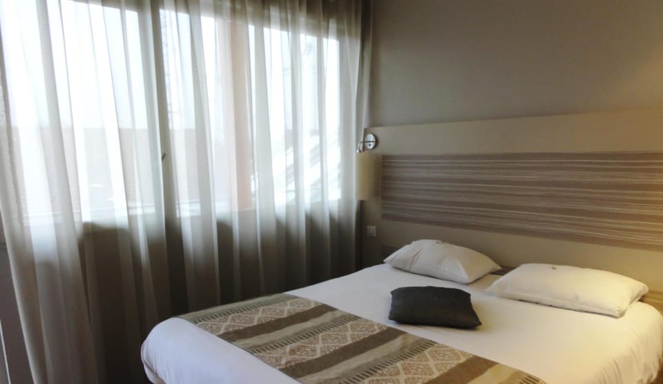Premium bedding, individually furnished, desk, laptop workspace