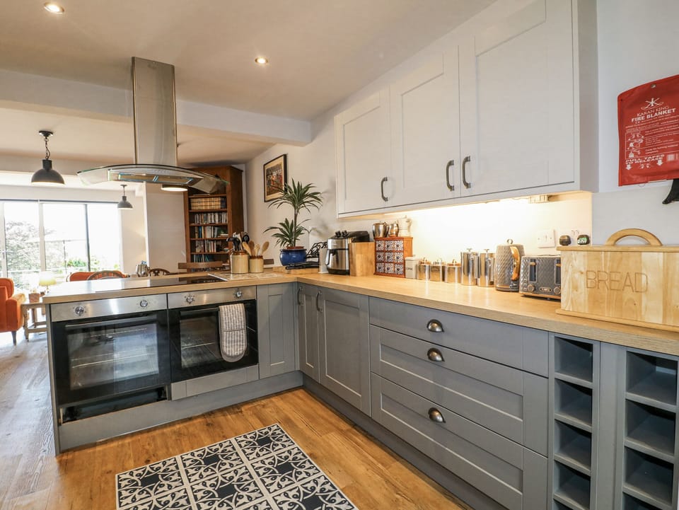 Fridge, microwave, toaster, cookware/dishes/utensils