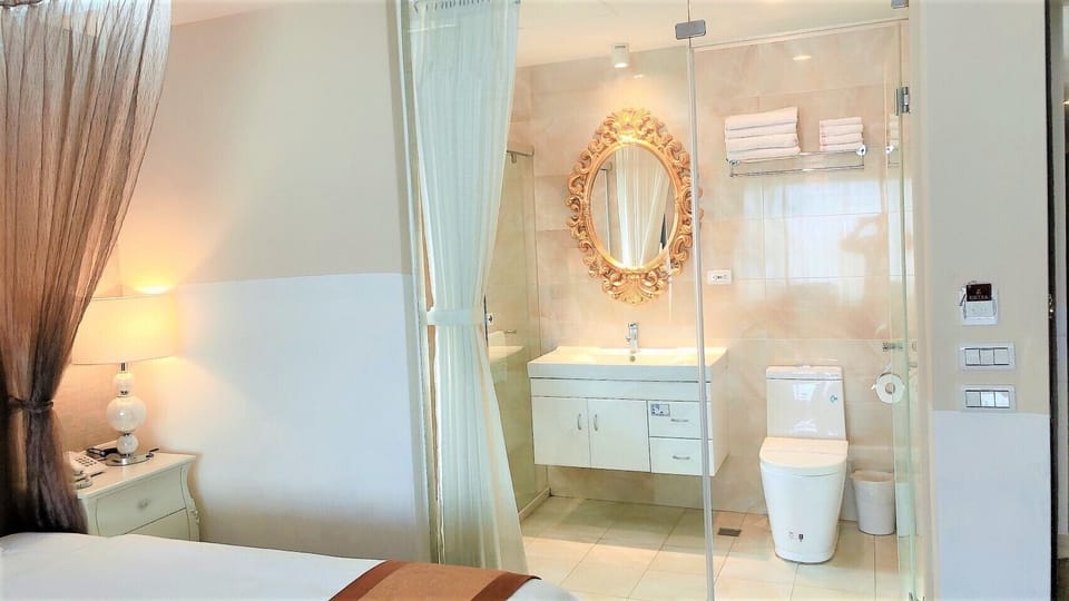 Shower, hydromassage showerhead, eco-friendly toiletries, hair dryer
