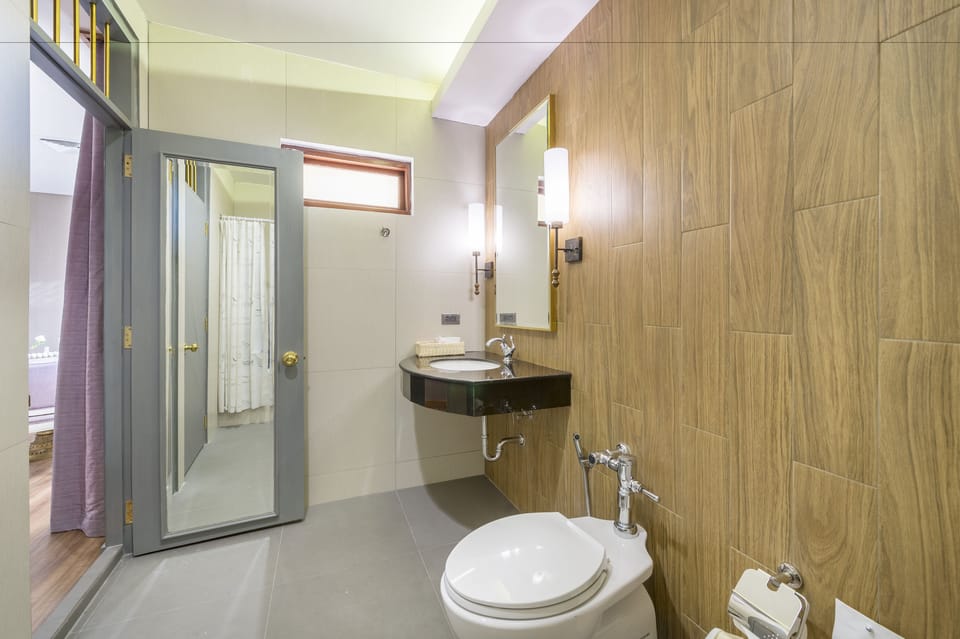 Suite, 2 Bedrooms | Bathroom | Shower, rainfall showerhead, free toiletries, hair dryer