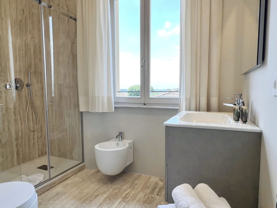 Shower, hair dryer, bathrobes, slippers