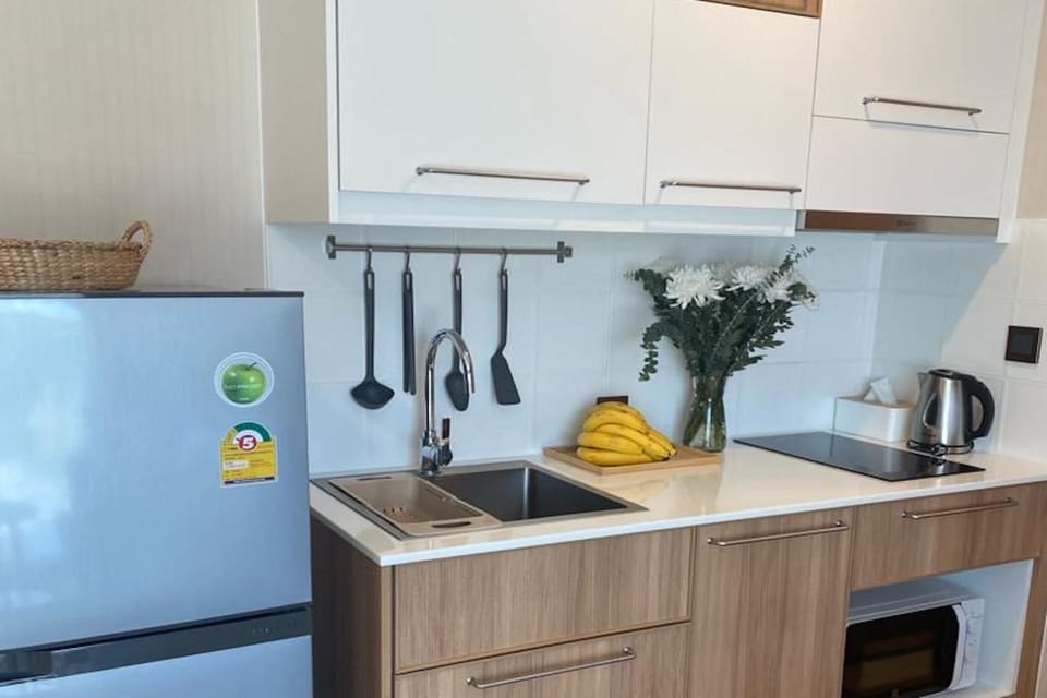 Exclusive Apartment, Balcony, Garden View | Private kitchen | Electric kettle