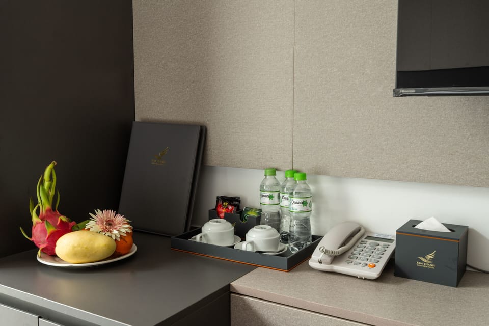 Deluxe Triple Room, City View | In-room dining