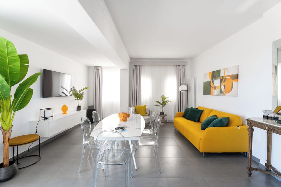 Design Apartment, 2 Bedrooms, Sea View | Living area | 55-inch Smart TV with satellite channels