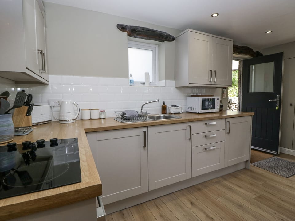 Fridge, microwave, toaster, cookware/dishes/utensils