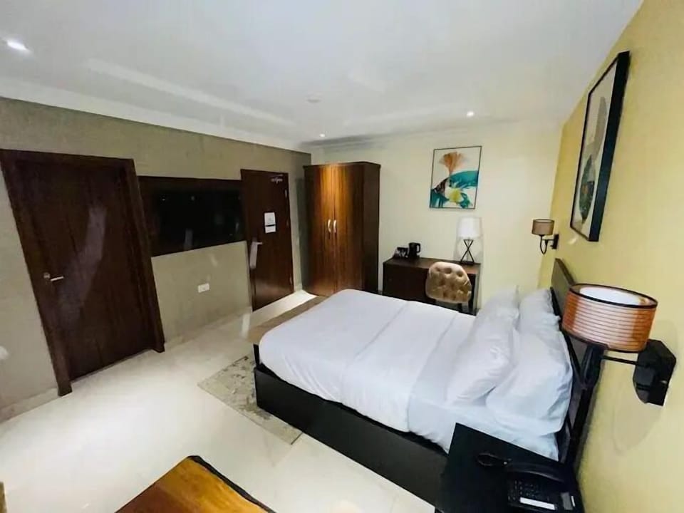 Deluxe Room, Balcony, City View | Desk, laptop workspace, free WiFi