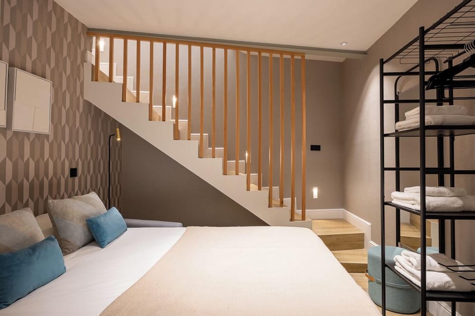 Deluxe Double or Twin Room | Laptop workspace, blackout drapes, soundproofing, iron/ironing board